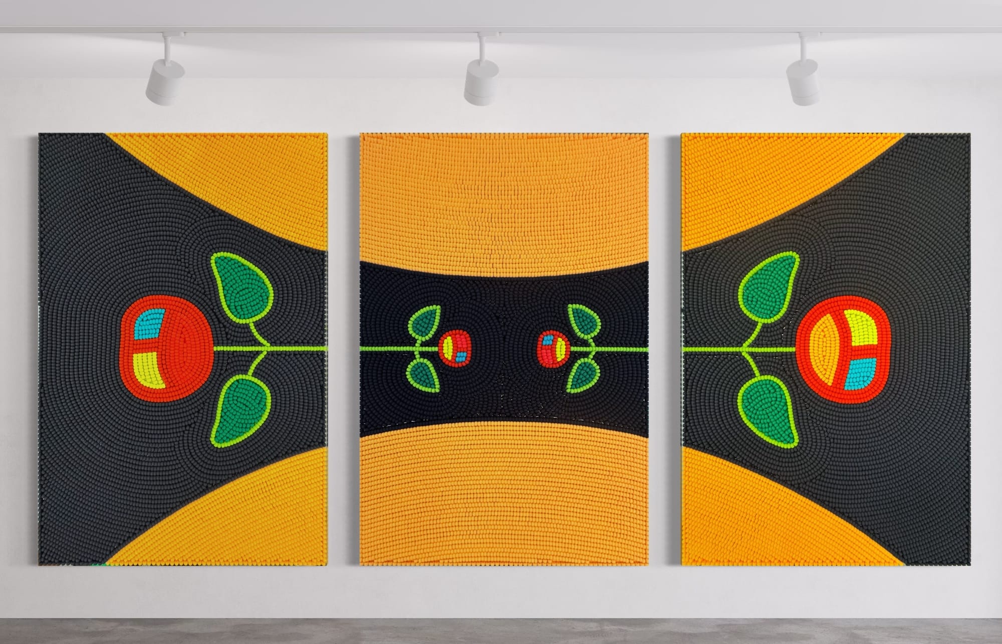 a triptych by Renee Condo of three beaded panels with cherry-like forms emerging from the center
