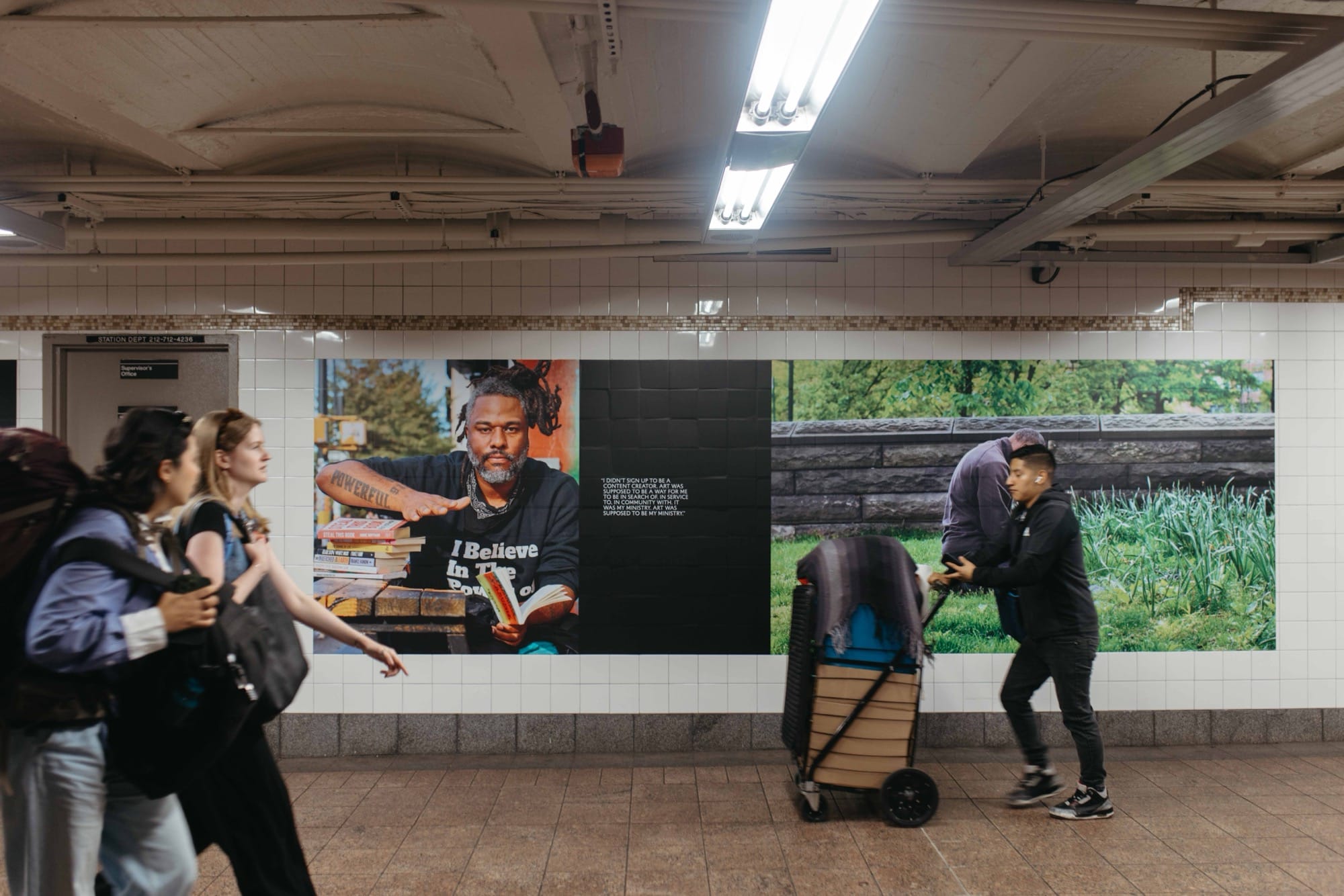 a photo installation of Brandon Stanton's Dear New York in the subway