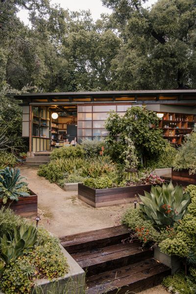 <span style="font-family: Theinhardt, -apple-system, BlinkMacSystemFont, "Segoe UI", Roboto, Oxygen-Sans, Ubuntu, Cantarell, "Helvetica Neue", sans-serif;">The ceramics studio was built on the posts and beams of an abandoned pergola from the old estate. Its new enclosure consists of a roof elevated off of the original rafters, and glazing applied directly to shelves that are suspended between the original columns.</span>