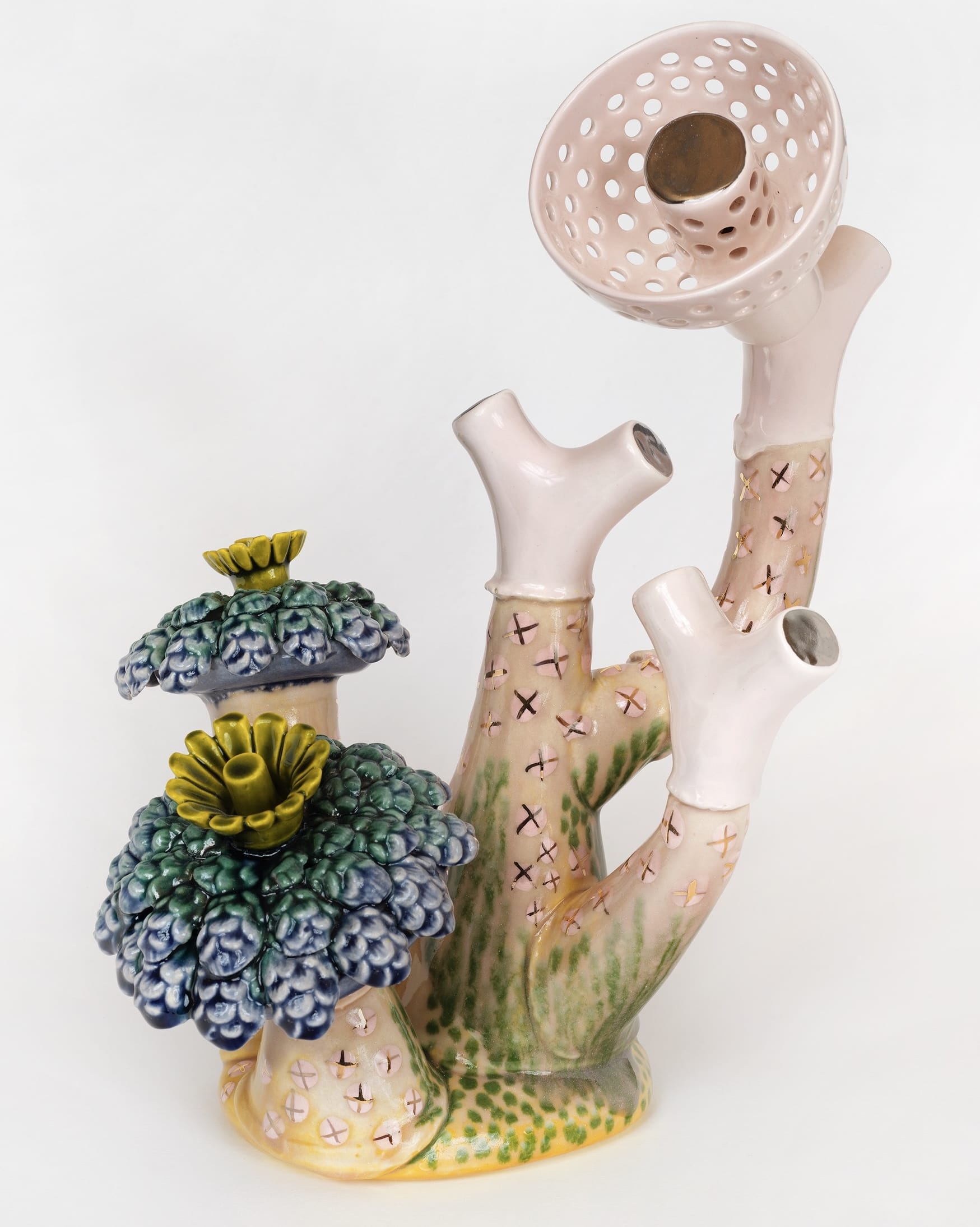 a ceramic sculpture by Megan Bogonovich resembling an abstract, otherworldly plant or flower