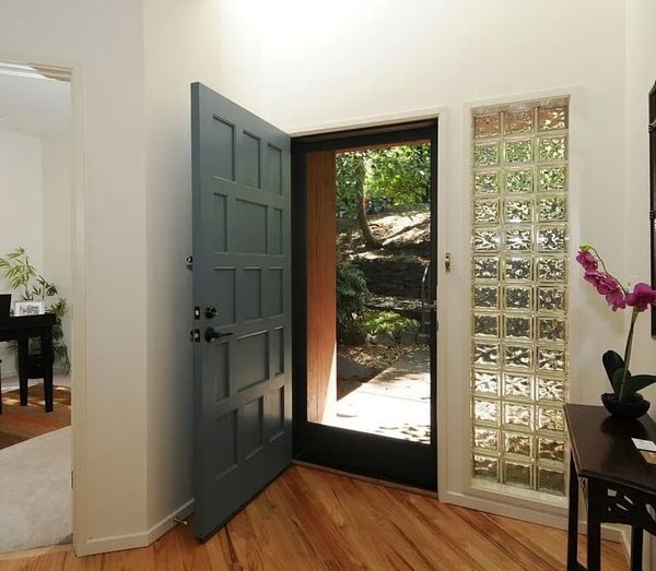 Before: SHED wanted to preserve the entry bridge and the curved walls inside, but eliminated the glass block.