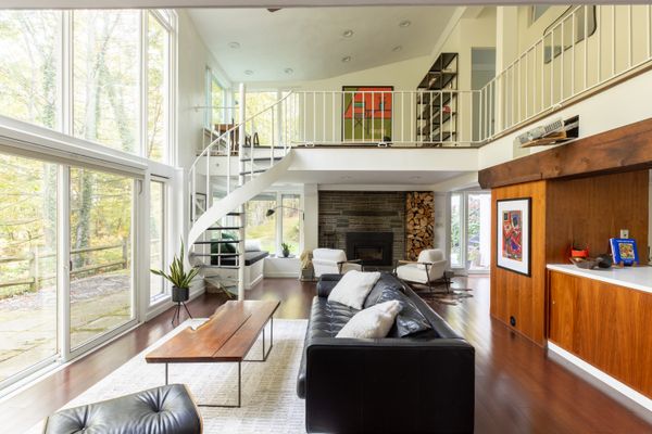 The designer and owner was an abstract expressionist focusing on landscapes, and the attenuation to nature carries through to his home.