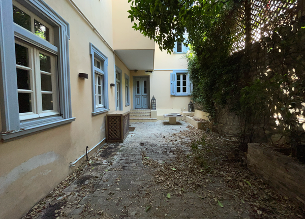 The overgrown garden was blocking the natural light from entering the house.